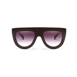 Front view of brown , flat top oversized sunglasses, with black gradient lenses.
