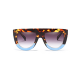 Front view of leopard and blue, flat top oversized sunglasses, with black gradient lenses.