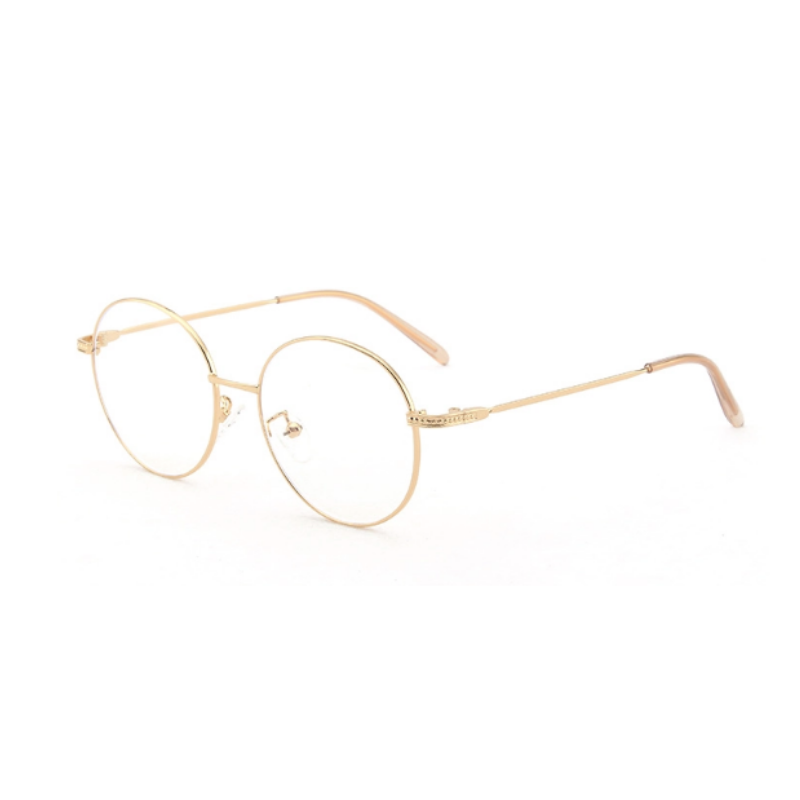 Side view of gold, circle blue light blocking glasses.