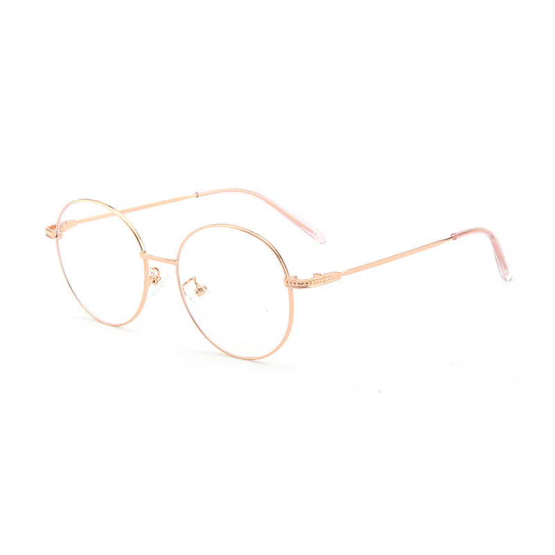 Side view of rose gold, circle blue light blocking glasses.