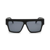 Front view of black, square sunglasses, with dark lenses.