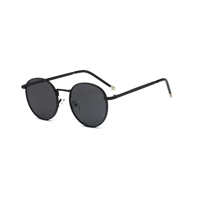 Side view of black, circle sunglasses, with dark lenses.