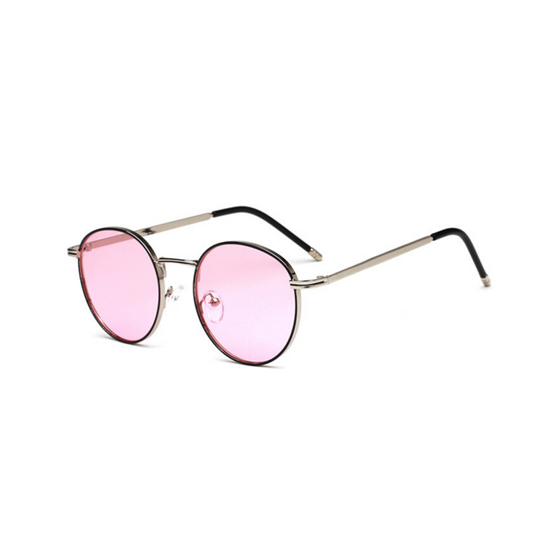 Side view of pink, circle sunglasses, with pink tinted lenses.