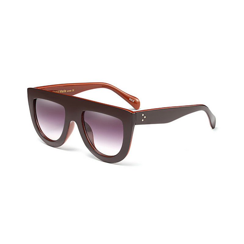 Side view of brown , flat top oversized sunglasses, with black gradient lenses.