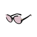 Side view of pink, large cat eye sunglasses, with mirror lenses.